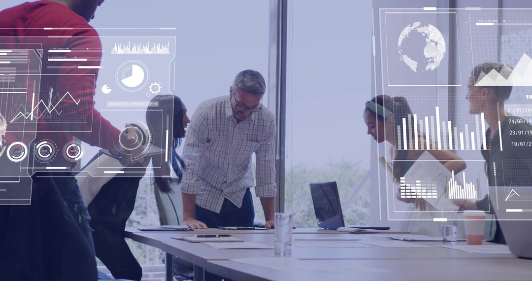 Corporate Team Analyzing Data with Digital Charts and Laptop in Office