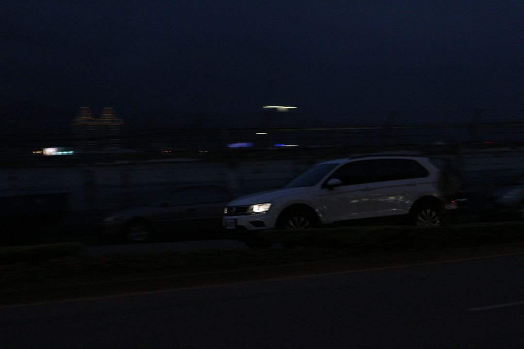 White SUV Driving on Road During Nighttime - Free Images, Stock Photos and Pictures on Pikwizard.com