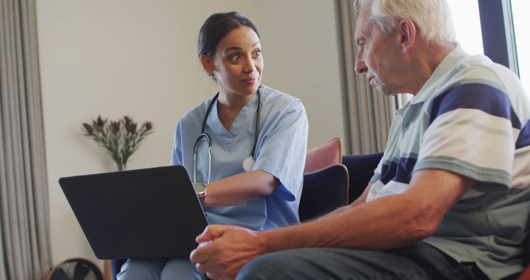 Nurse Conversing with Elderly Patient During Home Visit - Free Images, Stock Photos and Pictures on Pikwizard.com