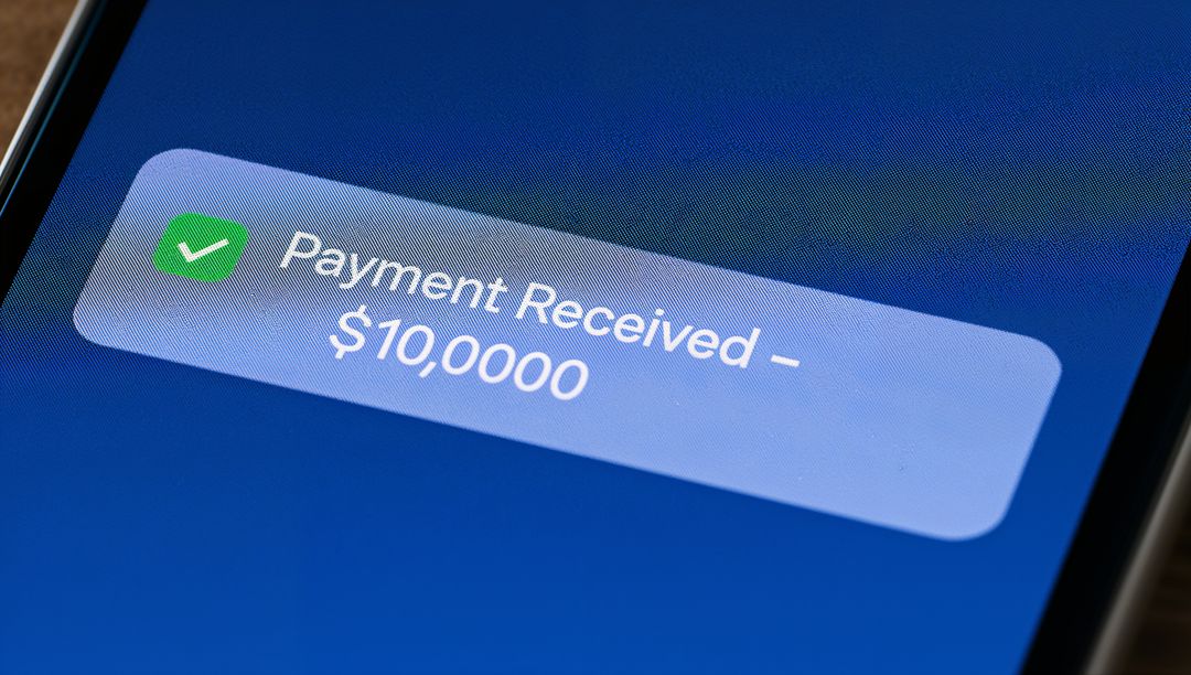 Close-up of Payment Notification on Smartphone Screen