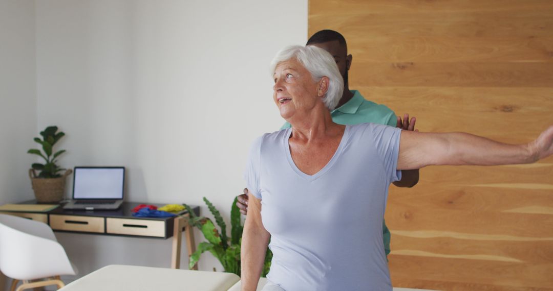 Senior Woman Receiving Physical Therapy in Modern Clinic - Free Images, Stock Photos and Pictures on Pikwizard.com