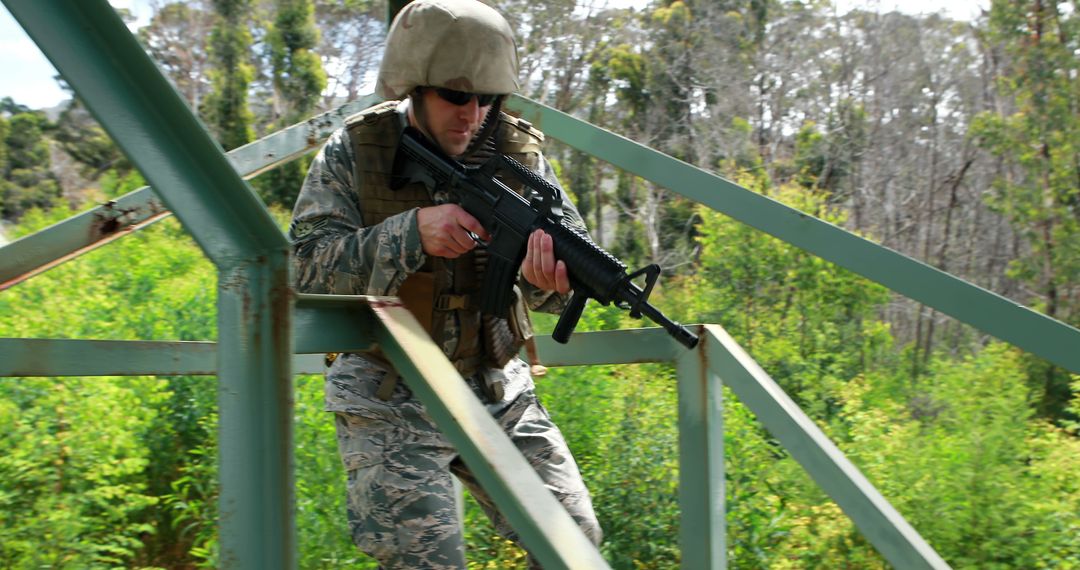 Military Soldier in Camouflage Conducting Training Exercise Outdoors - Free Images, Stock Photos and Pictures on Pikwizard.com