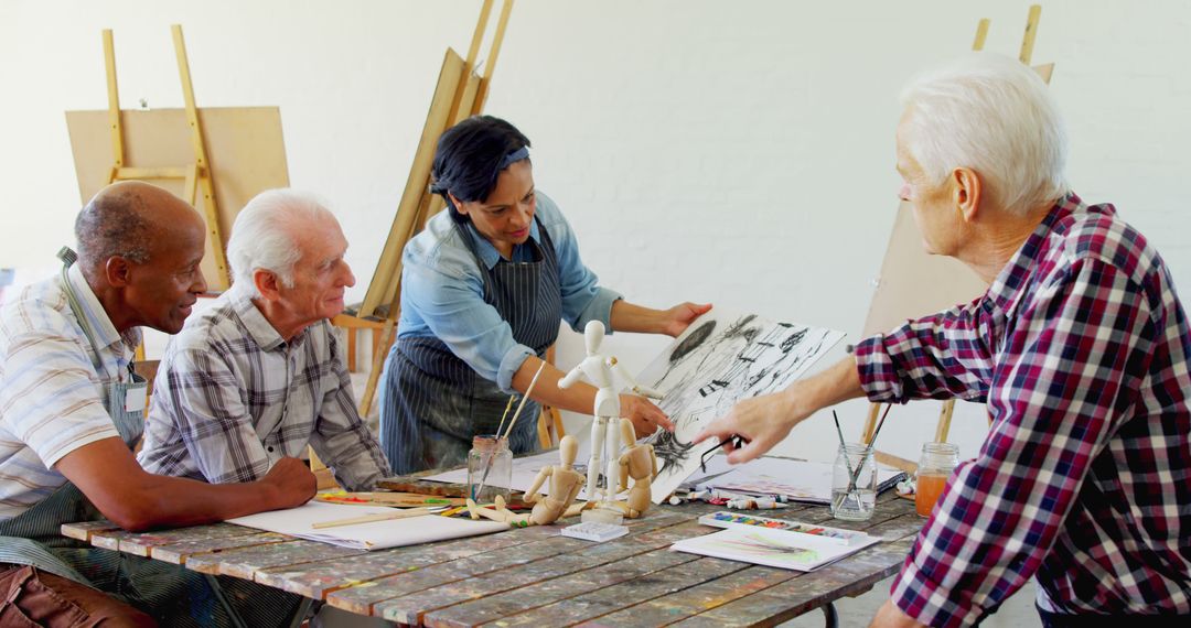 Art Instructor Guiding Senior Students During Drawing Class - Free Images, Stock Photos and Pictures on Pikwizard.com