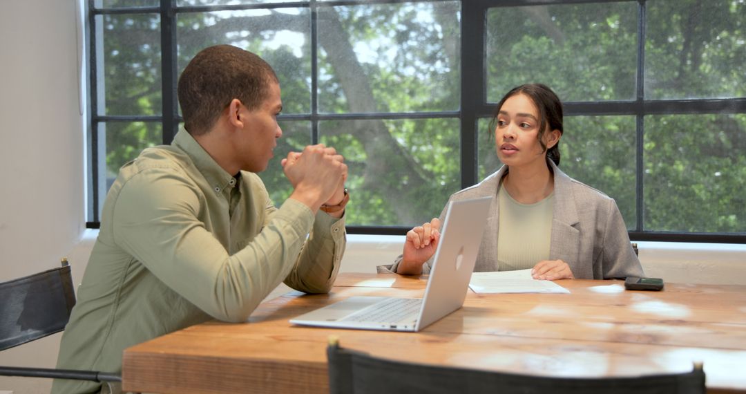 Business Meeting with Multiracial Professionals in Office Environment