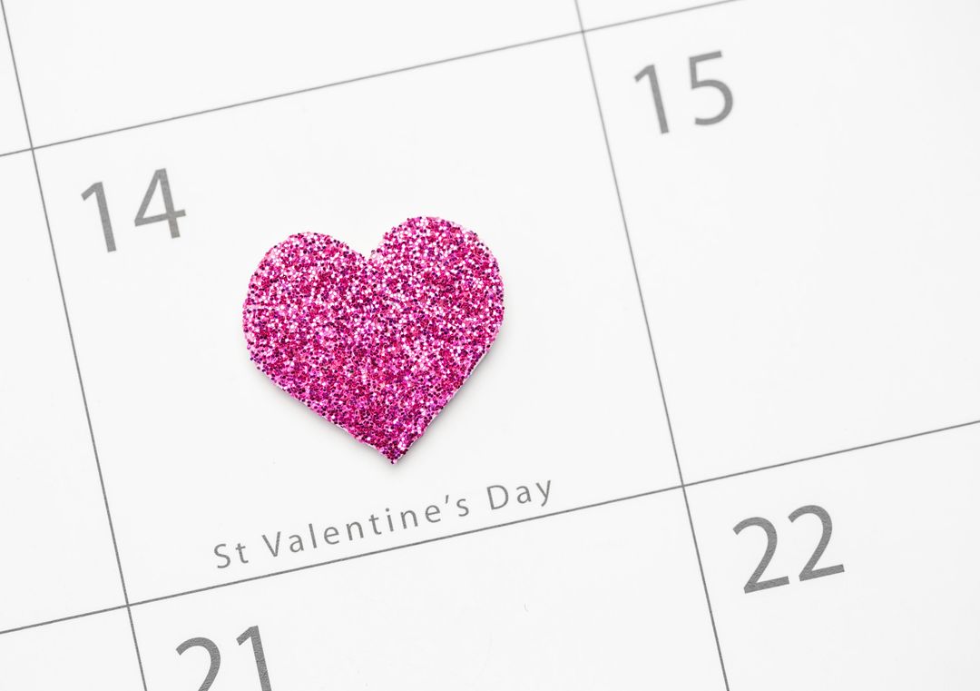 Sparkling Pink Heart Marks Valentine's Day on Calendar