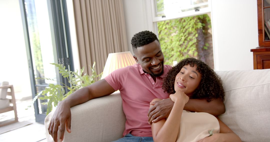 Relaxed Couple Enjoying Cozy Intimate Moment on Couch at Home