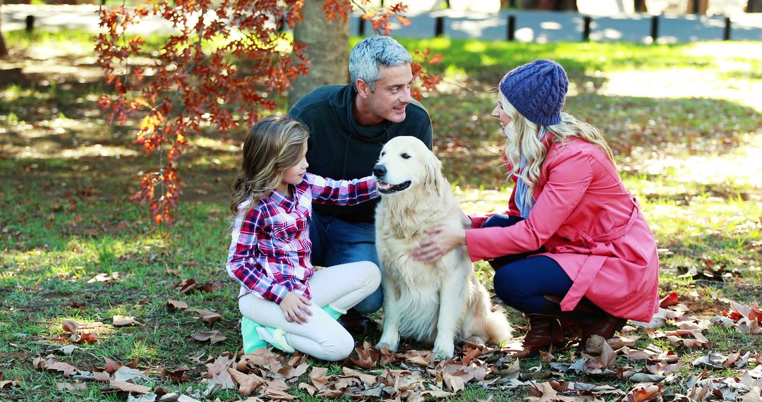 Family with Golden Retriever in Park During Autumn - Free Images, Stock Photos and Pictures on Pikwizard.com