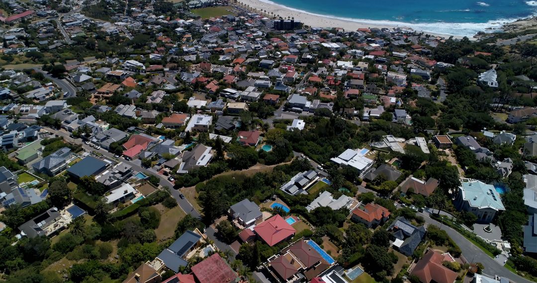 Aerial View of Coastal Urban Community by the Beach - Free Images, Stock Photos and Pictures on Pikwizard.com