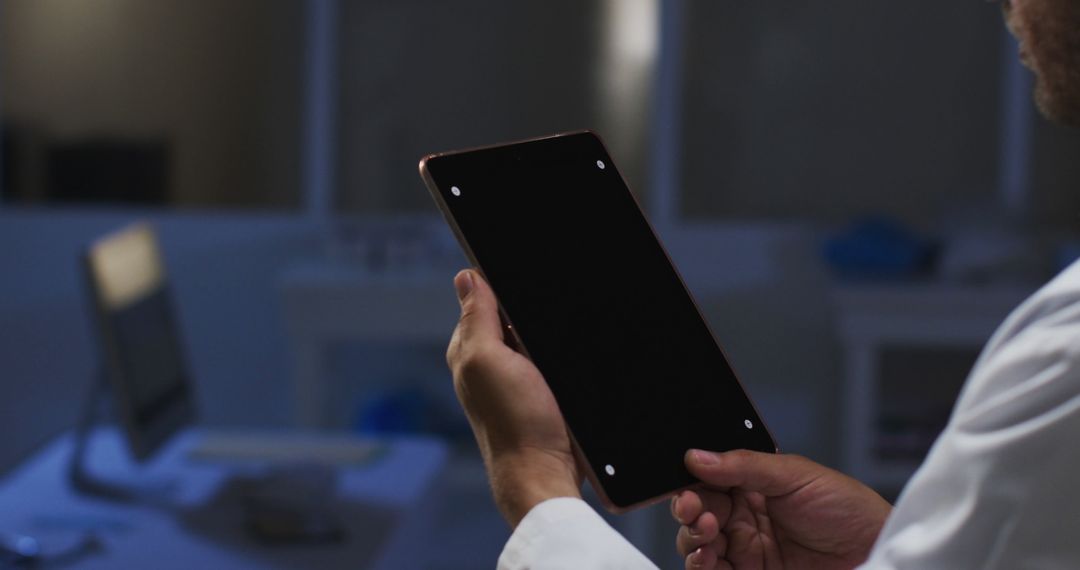 Doctor Holding Digital Tablet in Medical Office - Free Images, Stock Photos and Pictures on Pikwizard.com