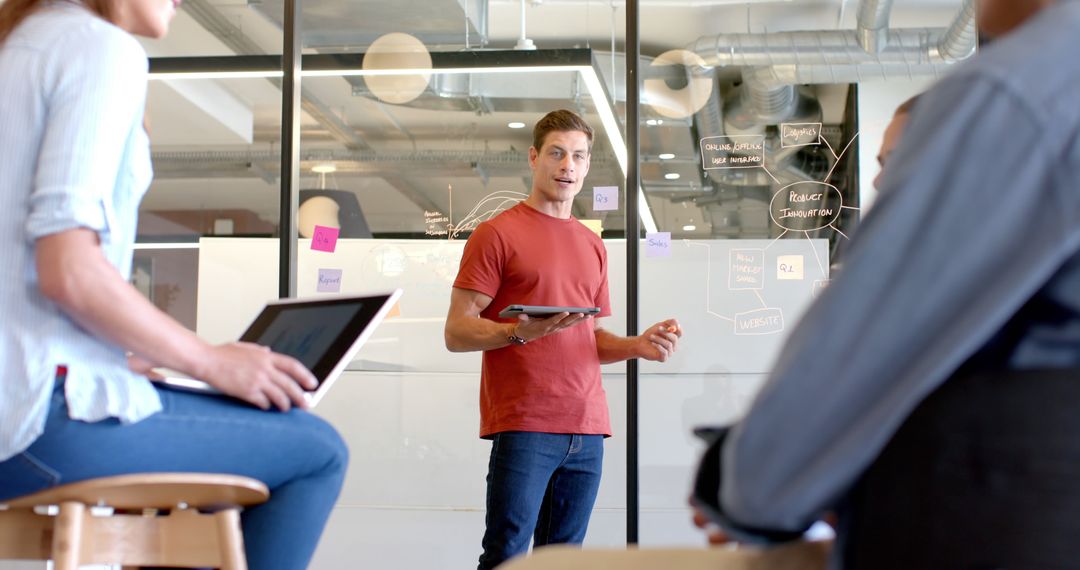 Business Team Conducting Brainstorming Session in Modern Office