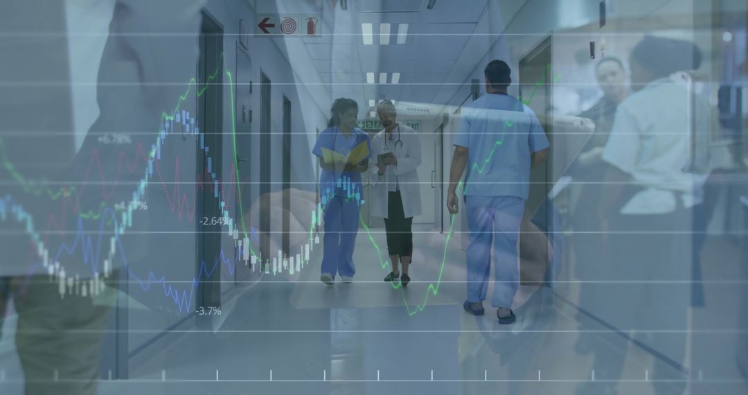 Senior Doctor and Nurse Analyzing Health Data in Hospital Corridor