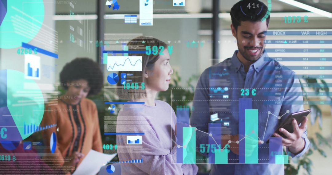 Diverse Team Analyzing Digital Data on Tablet in Modern Office Environment