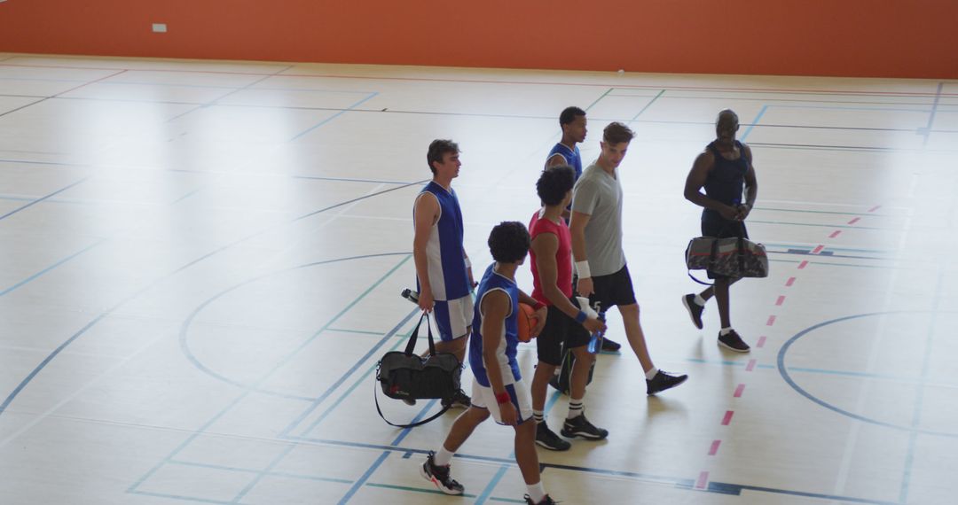 Diverse Basketball Team and Coach Celebrating After Match