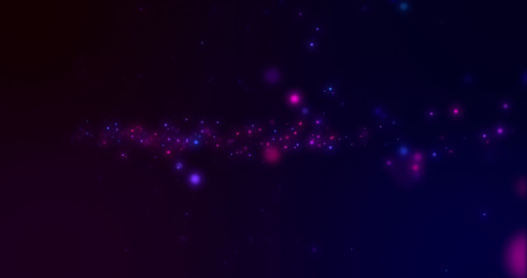 Glowing Nebulous Particles on Dark Background