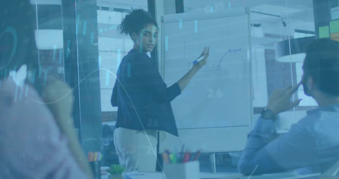 Diverse Team Analyzing Financial Data Together for Business Strategy