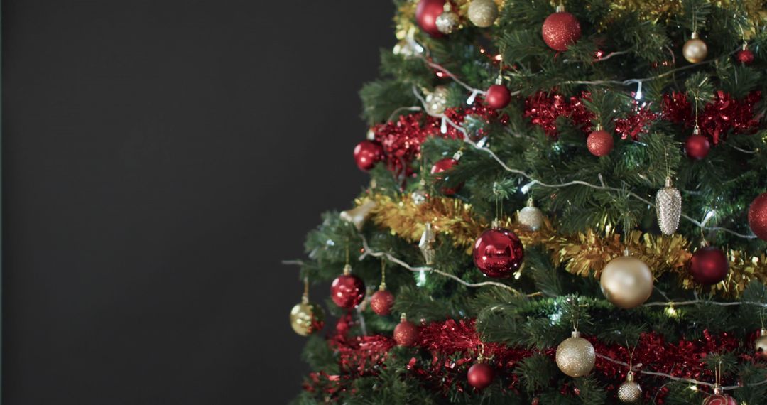 Festive Christmas Tree with Ornate Red and Gold Decorations