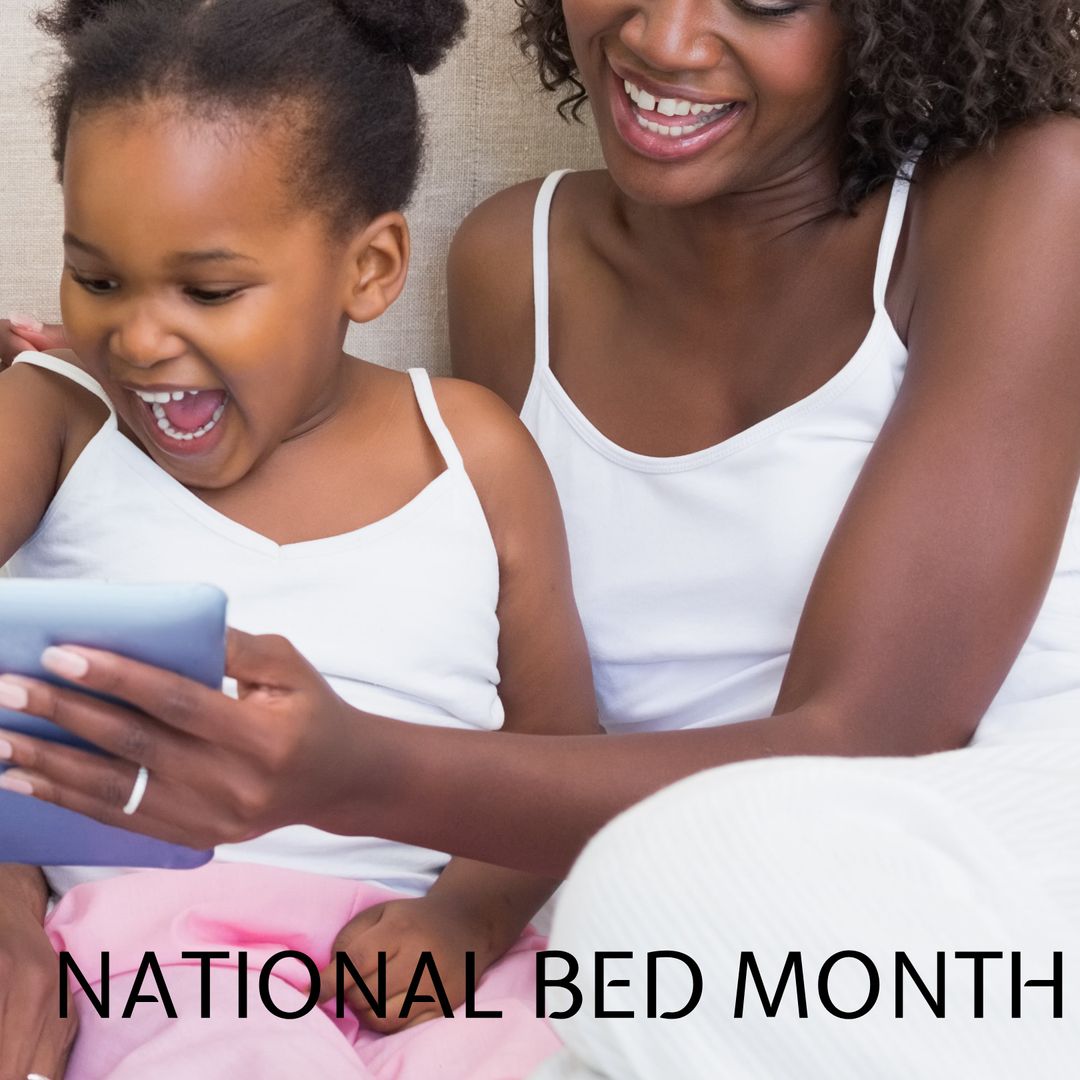 Joyful Mother and Child Sharing Moments Relaxing in Bedroom