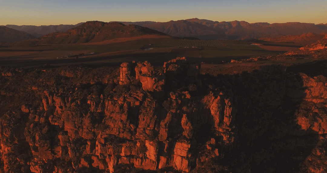 Majestic Transparent Eroded Mountains at Sunset Elevating Horizon