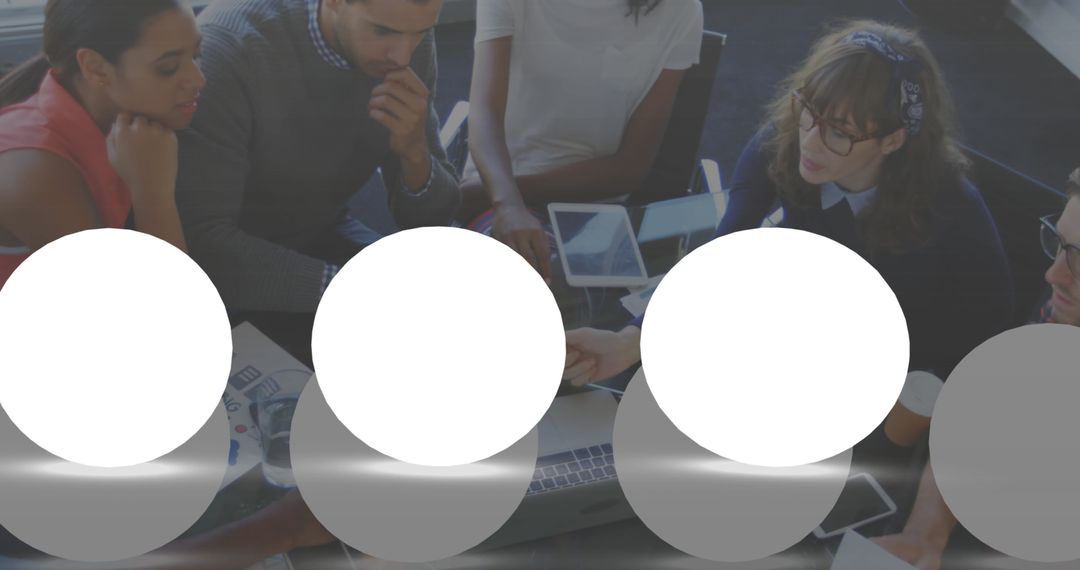 Diverse Team Collaborating in Modern Office with Technology Innovations