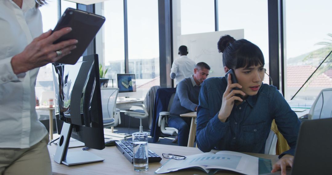 Busy Office Scene with Diverse Professionals Collaborating