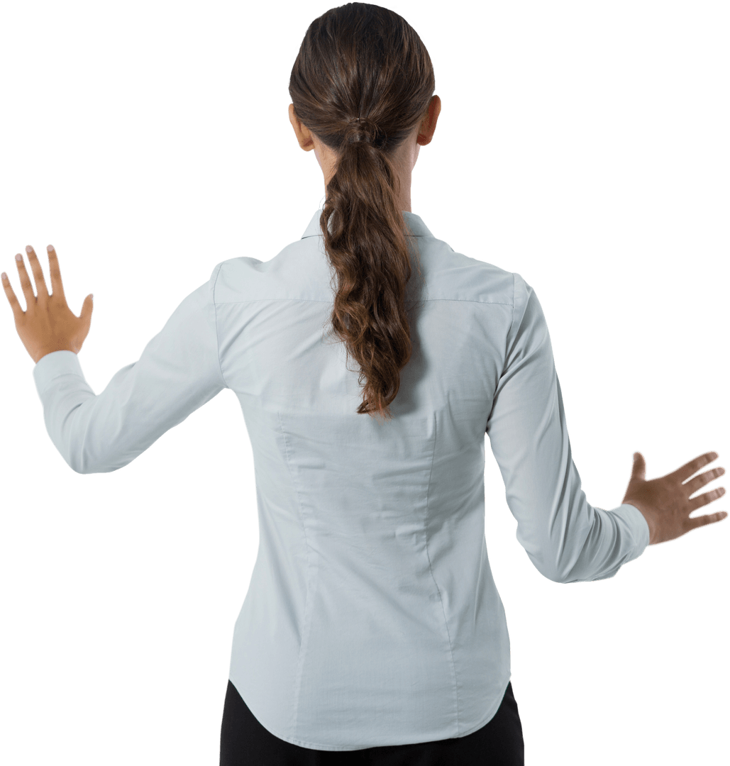 Rear View of Female Executive Using Transparent Touch Interface