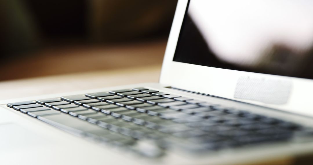 Close-Up of Laptop Keyboard in Modern Home Environment