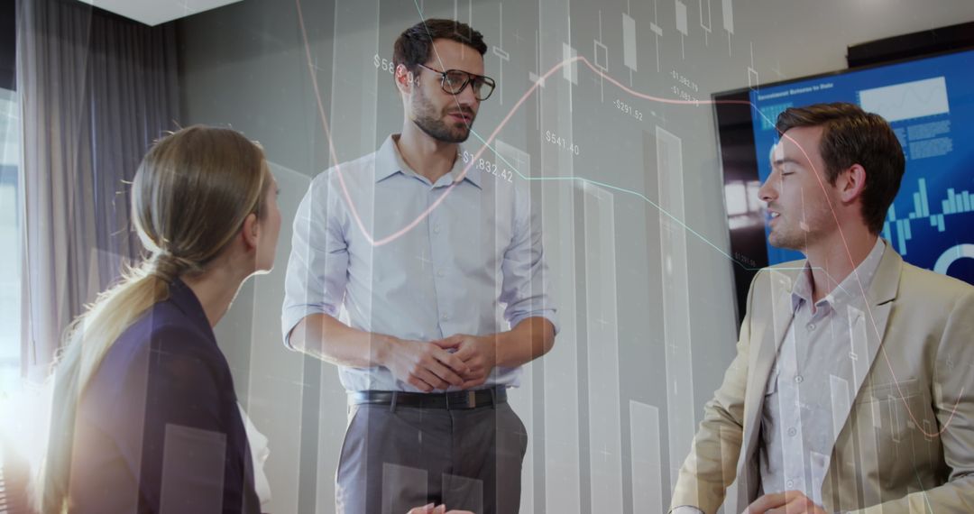 Diverse Colleagues Discussing Business Data Analytics at Office