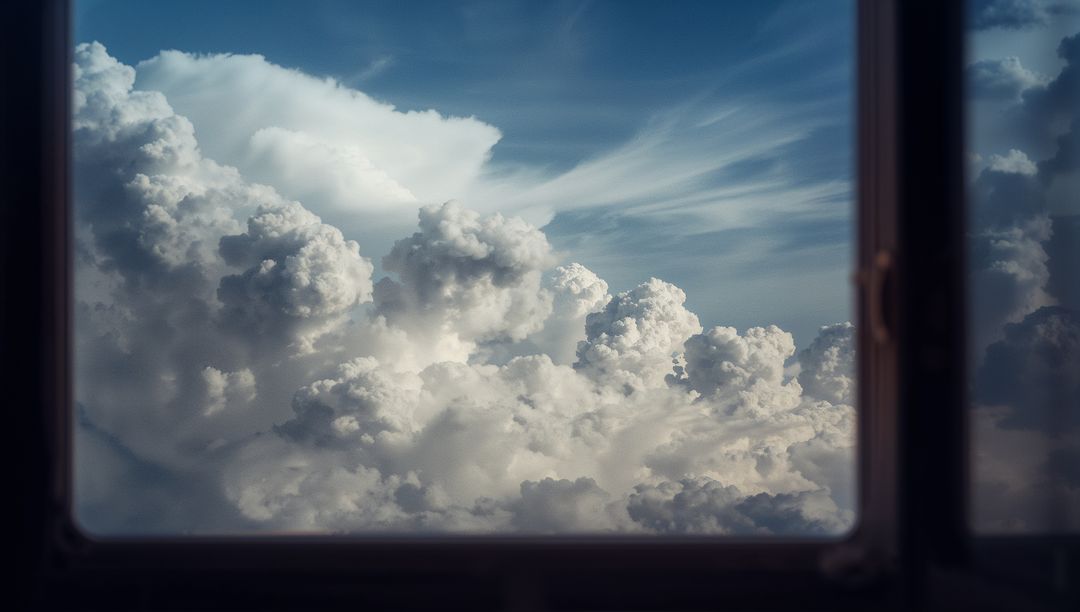 Vivid Clouds Seen Through Airplane Window