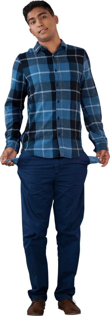 Frustrated Young Man Showing Empty Pockets Transparently