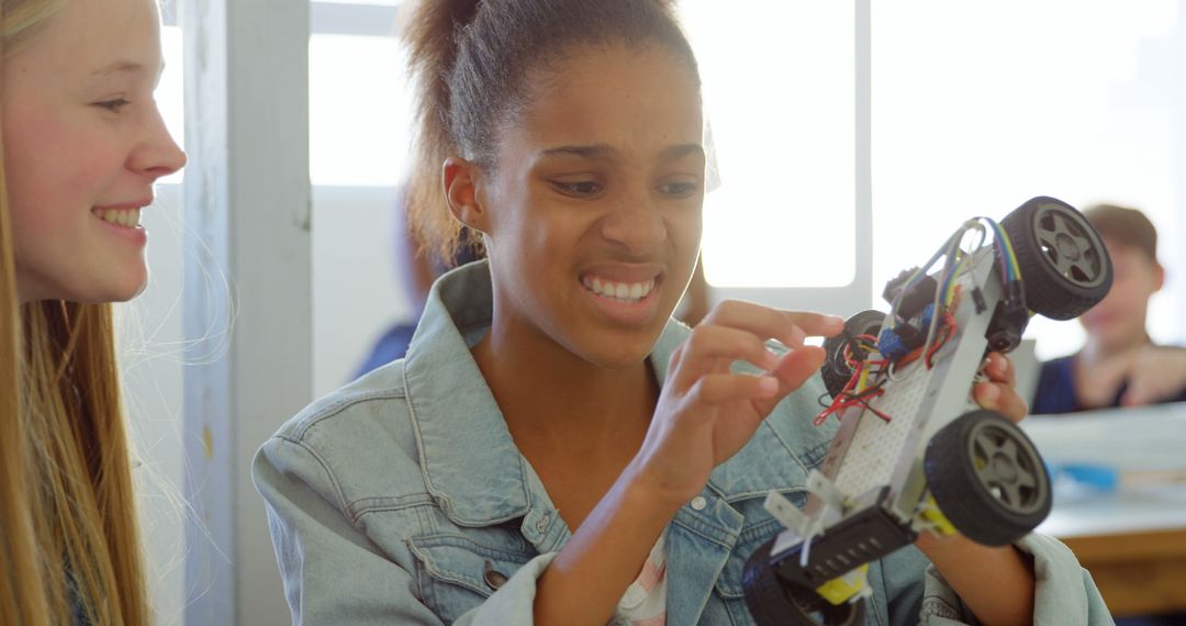 Teenage Girls Building Robot Car in STEM Class - Free Images, Stock Photos and Pictures on Pikwizard.com