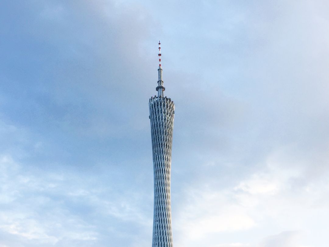 Highlighting Canton Tower Against Cloudy Sky - Free Images, Stock Photos and Pictures on Pikwizard.com