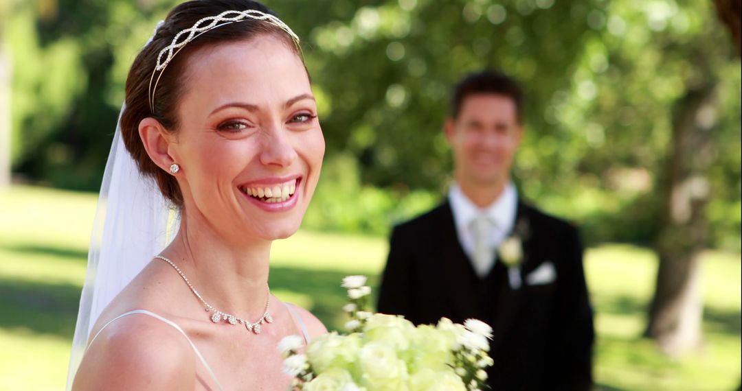 Radiant Bride Smiling Outdoors at Wedding - Free Images, Stock Photos and Pictures on Pikwizard.com