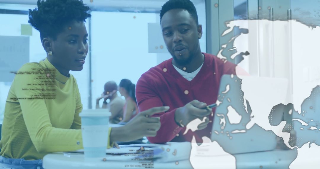 African-Co-Workers Collaborating in Modern Office Environment