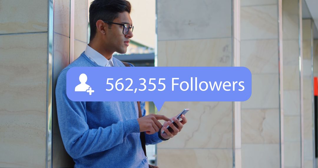 Young Man Engaged with Social Media Showing Follower Growth