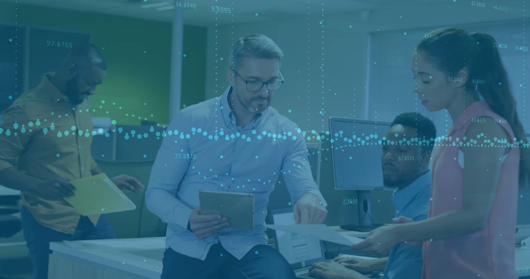 Diverse Professionals Collaborating on Financial Data in Modern Office