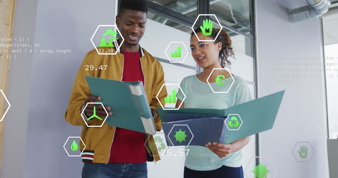 Colleagues Discussing Sustainable Business Data with Digital Graphics