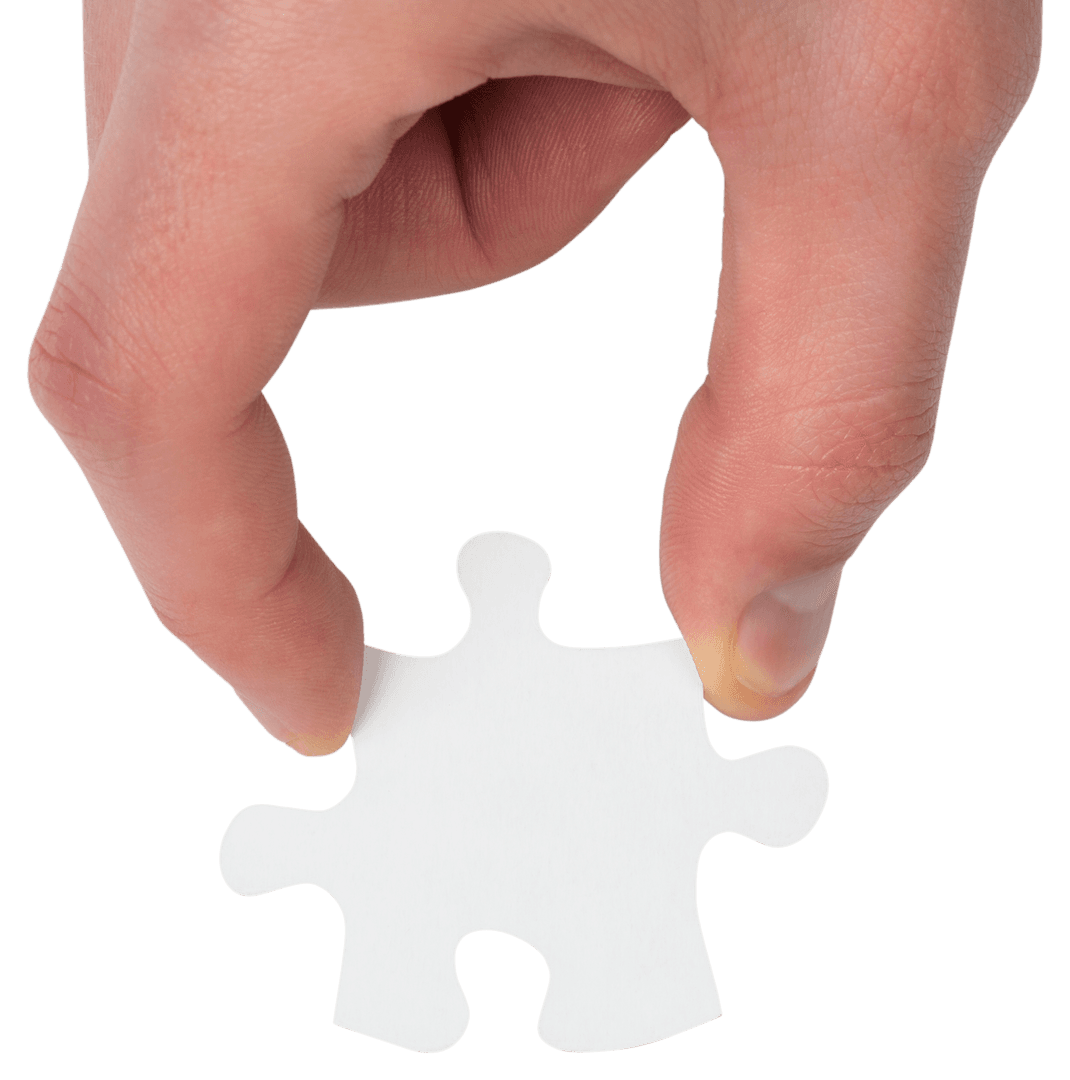 Hand Holding Transparent Jigsaw Puzzle Piece on White Background