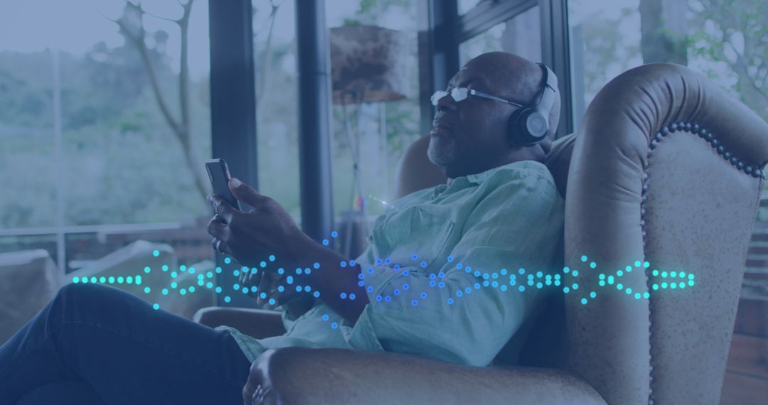 Man Relaxing with Headphones Demonstrates Audio Technology