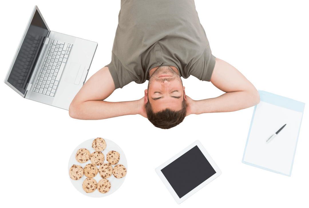 Relaxed Man Transparent Background with Gadgets and Cookies