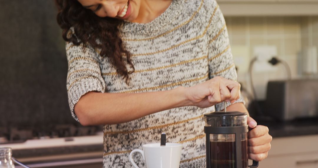 Woman Brewing Coffee in French Press in Cozy Kitchen - Free Images, Stock Photos and Pictures on Pikwizard.com