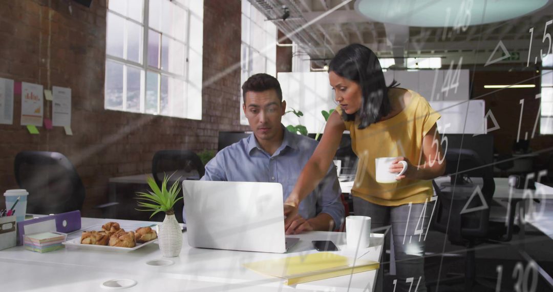 Collaboration in Modern Office Loft with Laptop Strategy