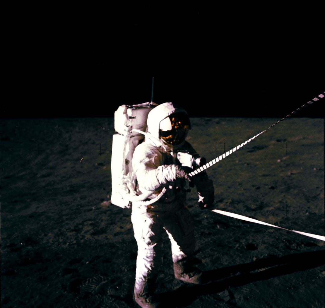 Astronaut Conducting EVA on Moon During Apollo 12 Mission - Free Images, Stock Photos and Pictures on Pikwizard.com