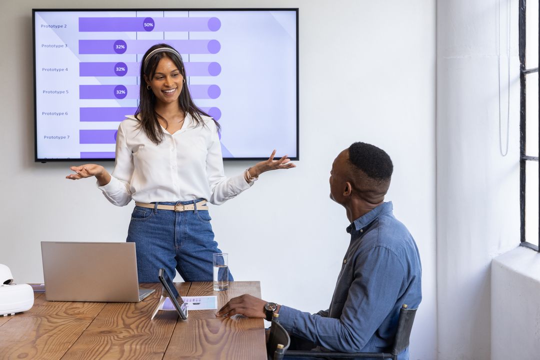 Presenting data and collaborating in modern office with laptop tablet and VR headset