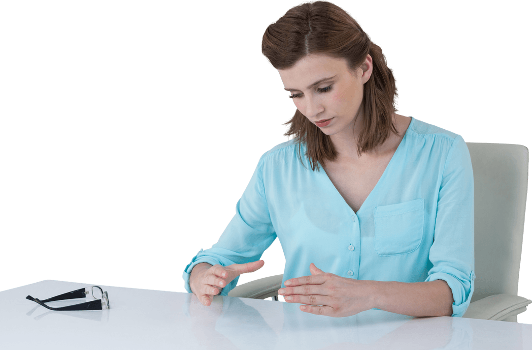 Businesswoman in Blue Blouse Gesturing While Seated, Transparent Background