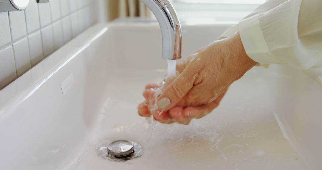 Close-up of Hands Washing Under Running Water in Sink - Free Images, Stock Photos and Pictures on Pikwizard.com