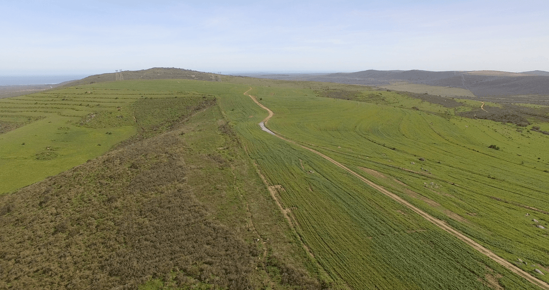 High Angle View of Lush Green Valleys with Rolling Hills