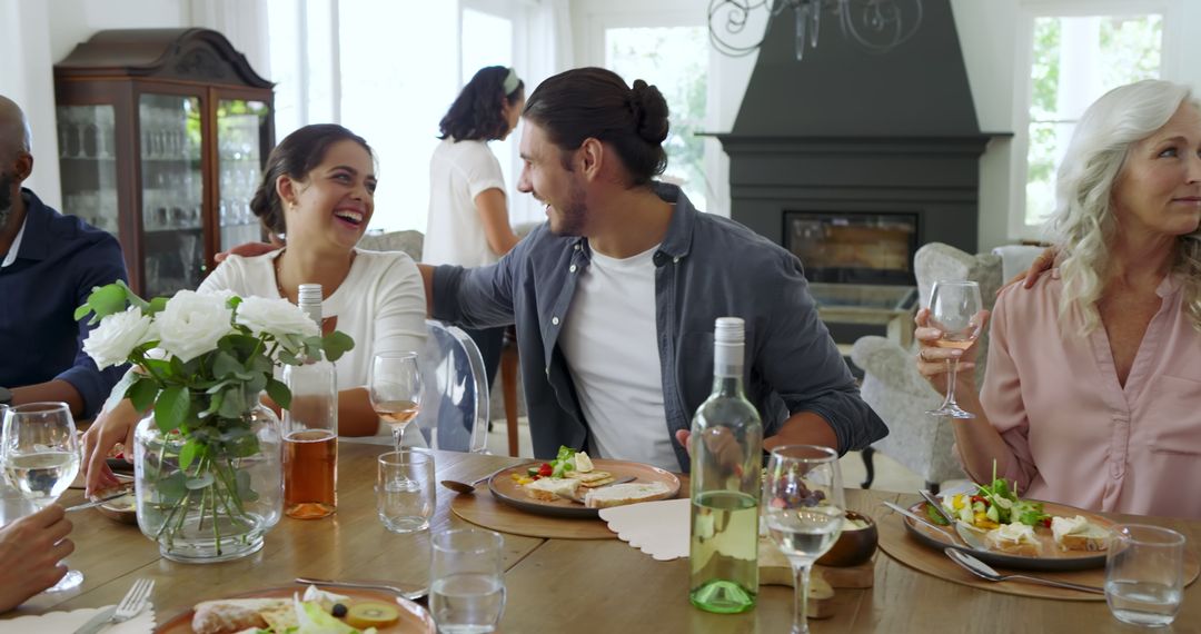 Friends Gathering at Home for Joyful Lunch Experience
