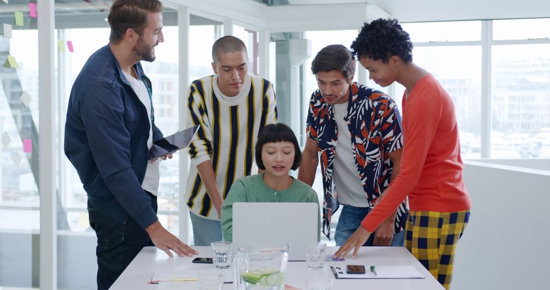Diverse Creative Team Collaborating in Bright Modern Office