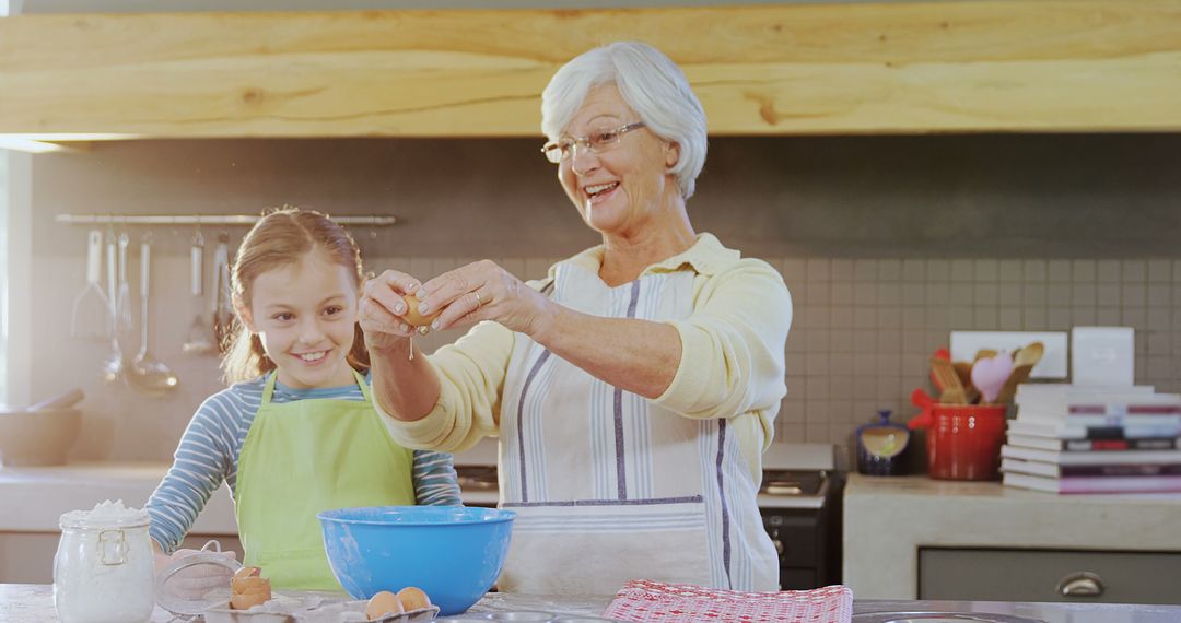 Grandmother and Granddaughter Baking Together in Kitchen Happiness - Free Images, Stock Photos and Pictures on Pikwizard.com