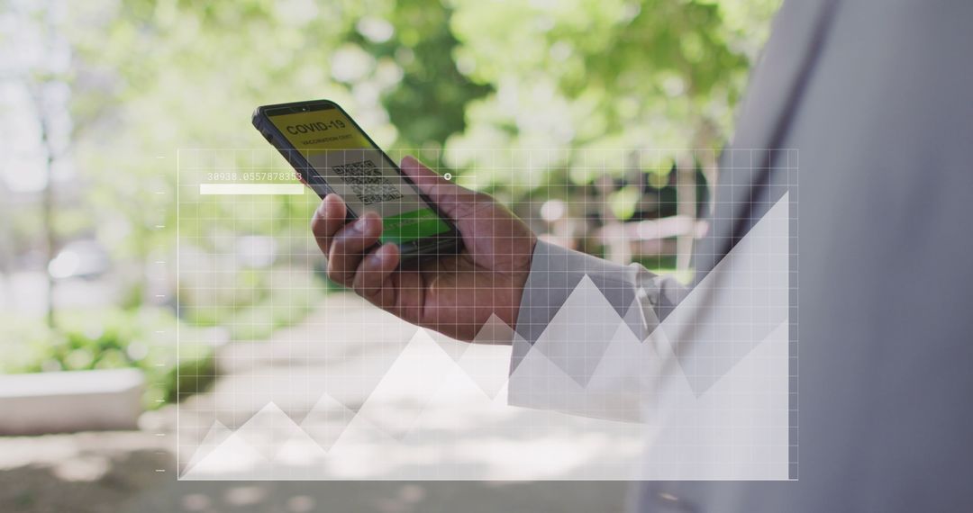 Businessman Analyzing Data on Smartphone Outdoors